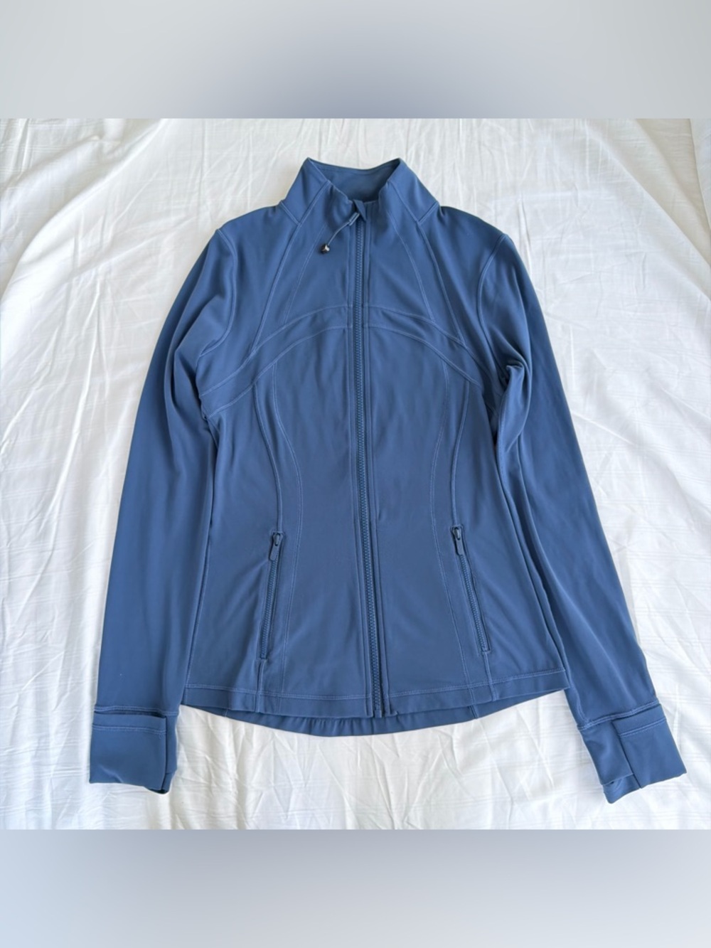 Lululemon Define jacket featuring a full-length zipper and convenient thumbhole